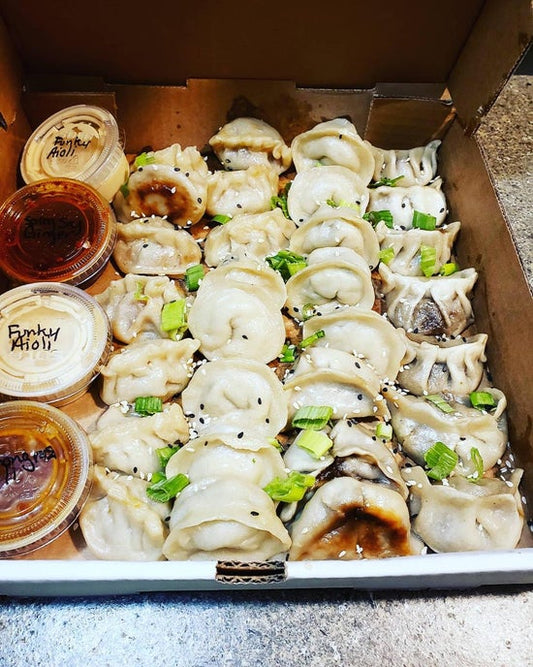 Big box of 30 steamed dumplings with dipping sauces